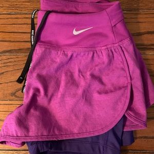 Nike Dry Fit shirts. Hot pink with purple inner spandex.  XS